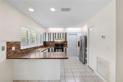 Tiny photo for 8765 SW 53rd St, Cooper City, FL 33328 (MLS # A12026641)
