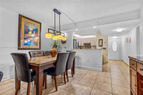 Photo of 711 S Hollybrook Dr #210, Pembroke Pines, FL 33025 (MLS # A11885733)