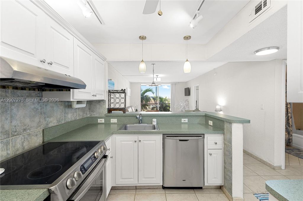 Photo of 1391 S Ocean Blvd #409, Pompano Beach, FL 33062 (MLS # A12007275)