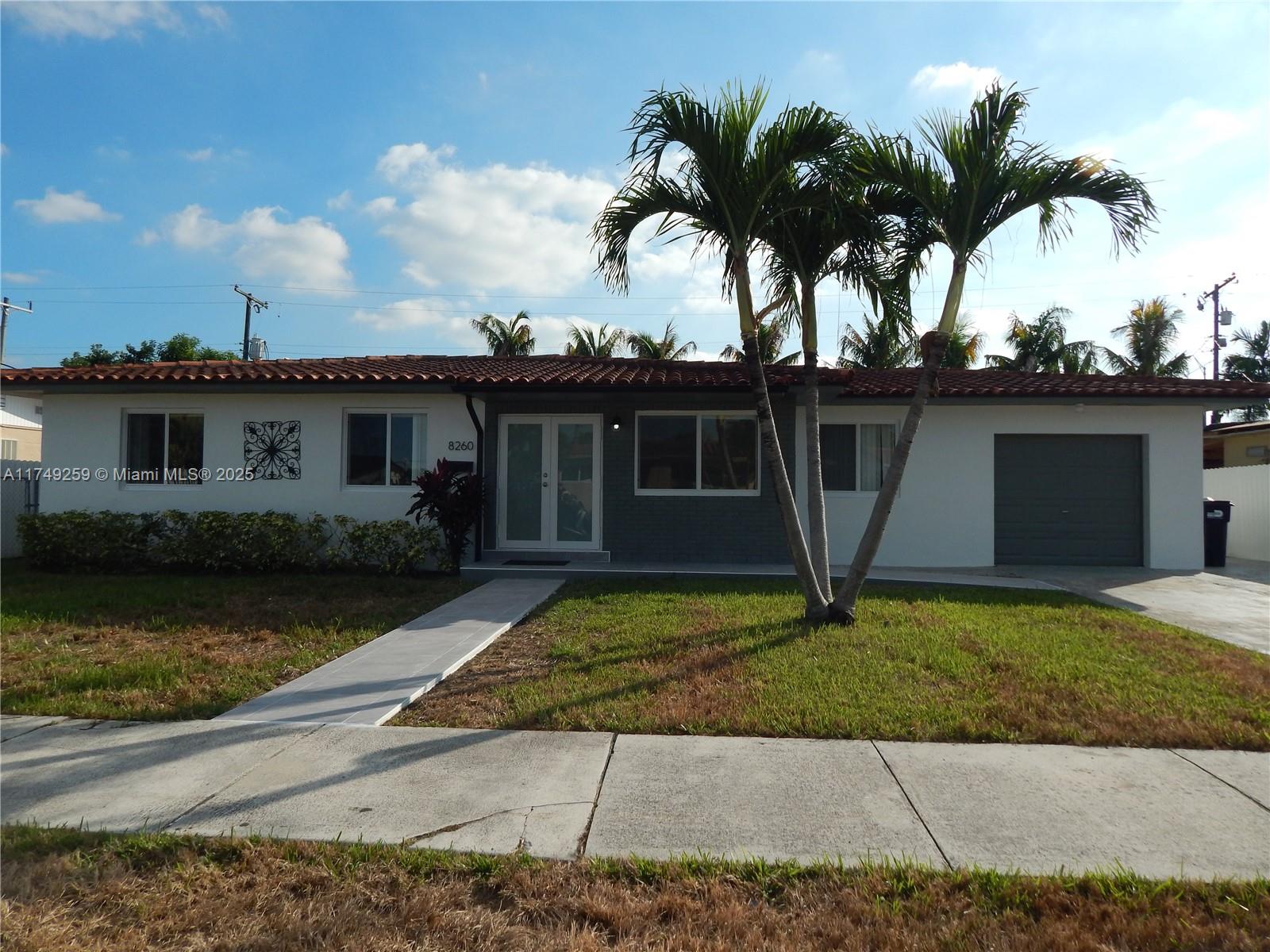 Newly remodeled home near Tropical Park. Featuring a large main house with 4 BEDROOMS/ 2 BATHS + 1 BEDROOM/ 1 BATH (COMPLETELY independent apartment of 950 sqft with with kitchen and den). Equipped with new impact windows and roof, ample exterior block storage room, relaxing terrace and back yard. Make your appointments thru Showing Assist.