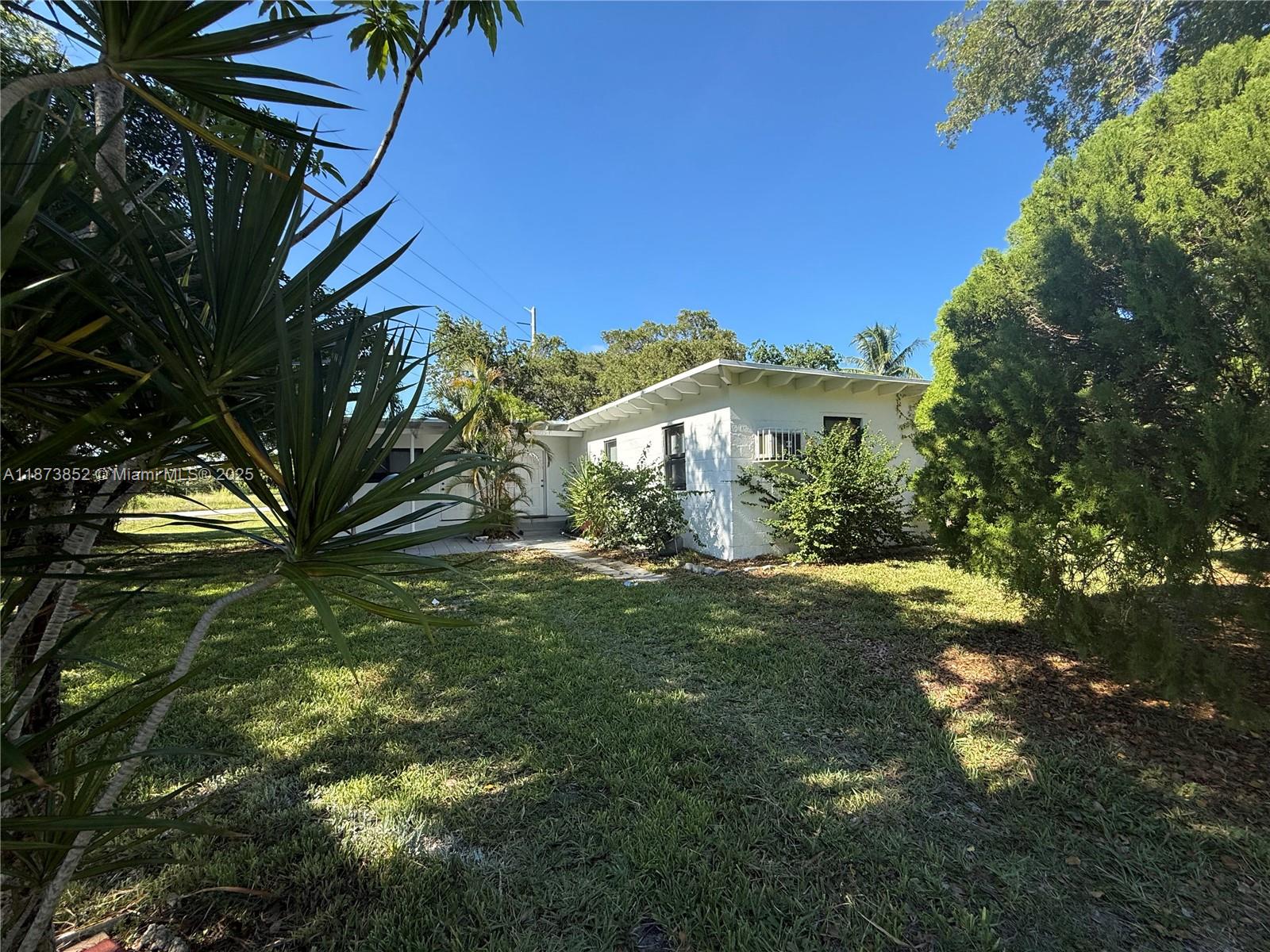 Welcome to this charming property in the heart of North Miami, offering both a single-family home and a private efficiency, perfect for flexible living arrangements. The main house features 2beds, 1 bath, a bright open living area, modern kitchen with ample cabinet space, and tile flooring throughout. The home is filled with natural light and offers a private fenced yard, ideal for outdoor enjoyment. The efficiency includes its own private entrance, full bathroom, providing comfort and independence for guests or extended family.. Located near Biscayne Blvd, I-95, and US-1, this home offers quick access to Miami Beach, Downtown, Aventura, Publix, Whole Foods, convenience stores, coffee shops, restaurants, shopping plazas, Biscayne Bay Campus and Barry University.