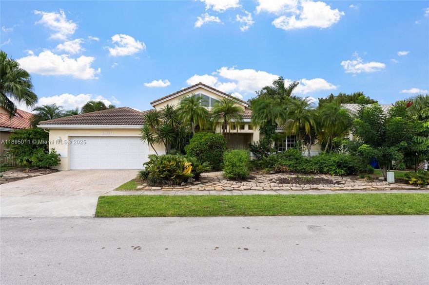 Beautiful 4 Bed / 2.5 Bath home with a pool and serene water view. Step inside to an inviting open layout filled with natural light. The modern kitchen seamlessly flows into the living and dining areas, creating the perfect space for entertaining family and friends.