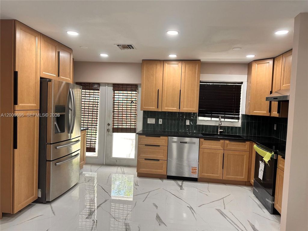 Photo of 3614 Everglades Rd, Palm Beach Gardens, FL 33410 (MLS # A12009595)