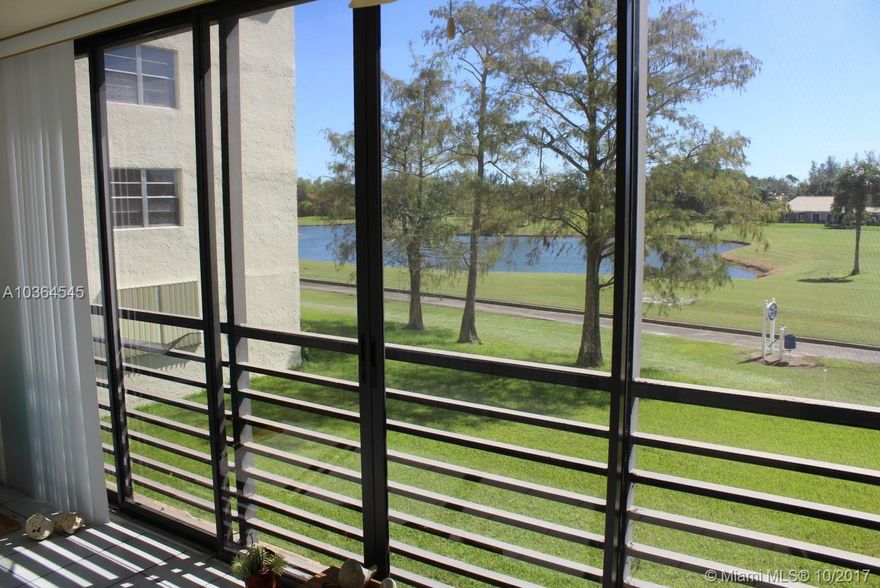 PRICE REDUCED!!! Highly sought after 2 bedrooms, 1 and a half baths in the towers at Holiday Springs Village. This condo is ready for you to make it your own. Gorgeous water and golf course views. Large screened balcony with glass sliding doors. Washer and Dryer in unit!! Holiday Springs Village is a very active community with resort style pool area and clubhouse. An additional satellite pool near the condo. Association represents 55+. No leasing.