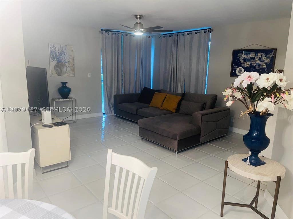 Photo of 10551 W Broward Blvd #111, Plantation, FL 33324 (MLS # A12070137)