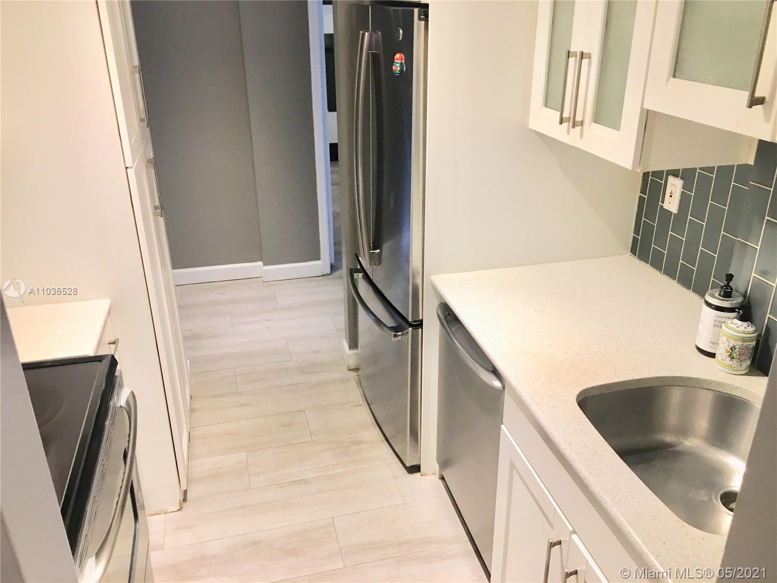 Boutique building located steps from shining beaches, restaurants, shops, super markets and minutes to South Beach and Bal Harbour shops. This remodeled unit has 2 bedroom 2 baths, 2 parking spaces , beautiful new wood tile floors throughout. New central A/C unit. It comes with three flat screen TV's. Both bedrooms come with custom closets including the master walking closet. Kitchen boasts Granite countertops, stainless steel appliances, microwave, dishwasher and washer & dryer inside the unit. Two gated parking spaces included. Corner unit with a large wrap around balcony and accordion hurricane shutters. Pets welcome under 20lbs