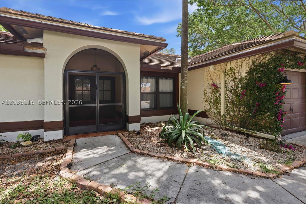 Photo of 10821 Paso Fino Dr, Lake Worth, FL 33449 (MLS # A12033116)