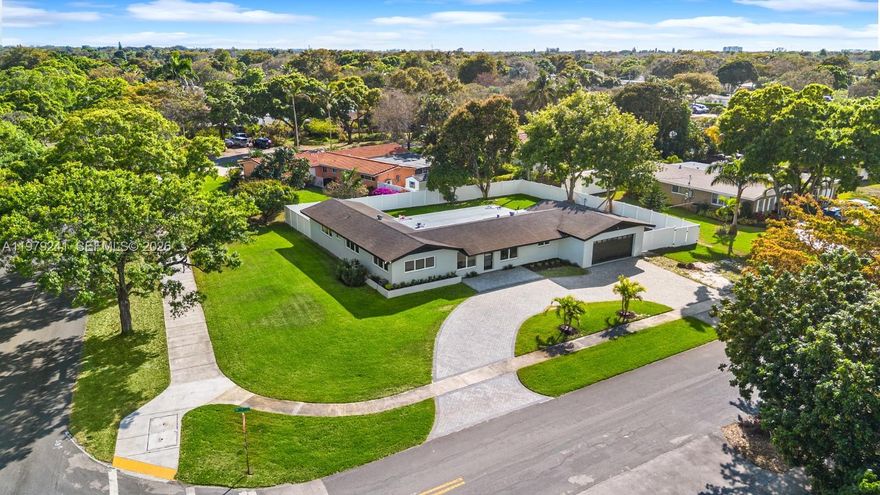 Completely remodeled 4-bedroom, 3-bathroom home in the heart of Plantation situated on an oversized 16,471 sq ft lot. This beautifully updated residence offers approximately 1,832 sq ft of living space and has been fully renovated with modern finishes throughout.

The home features a bright open-concept layout with a brand new kitchen including quartz countertops, stylish backsplash, new cabinetry, and stainless steel appliances. Upgrades include porcelain flooring throughout, impact windows, new AC ductwork, new electrical throughout the home, updated electrical for the newly constructed 424 sq ft addition, and fully renovated bathrooms.

Step outside to a spacious private backyard featuring a pool, brand new patio area, and newly fenced yard—perfect for entertaining or relaxing. The property also includes a 2-car attached garage with epoxy flooring and a brand new circular driveway offering ample parking and excellent curb appeal.

Ideally located just minutes from Broward Mall, Plantation Walk, parks, restaurants, and top-rated schools including Plantation Park Elementary, Seminole Middle School, and South Plantation High School. Convenient access to Broward Boulevard, Downtown Fort Lauderdale, Las Olas Boulevard, Fort Lauderdale Beach, and Fort Lauderdale-Hollywood International Airport.

Move-in ready and vacant for immediate showings.