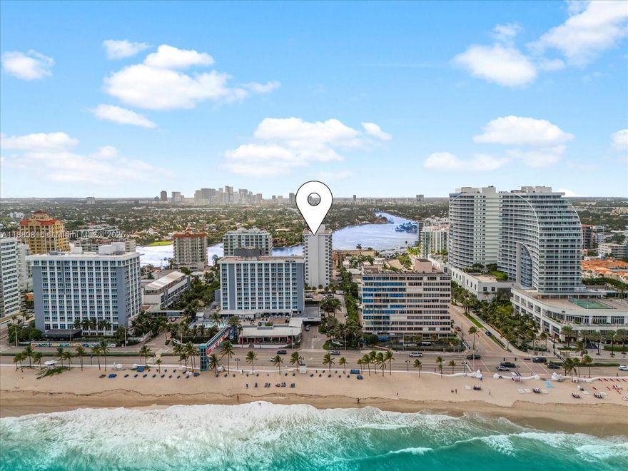 Luxurious sought-after Southeast corner penthouse is your private home in the sky, offering stunning, unobstructed views of the ocean, Intracoastal, and city skyline. Enjoy the sunrise over the Atlantic and breathtaking sunsets over Downtown Fort Lauderdale from your private balcony. Ideally located just one block from the beach and minutes from Las Olas, fine dining, and vibrant nightlife. The fully renovated, expansive open kitchen features stainless steel appliances, quartz and granite countertops, and Calacatta porcelain flooring throughout. The spacious primary suite includes an updated bathroom and a generous walk-in closet. Resort-style amenities include a tropically landscaped pool deck with cabanas, a barbecue and picnic area, sauna, library, and modern fitness center.