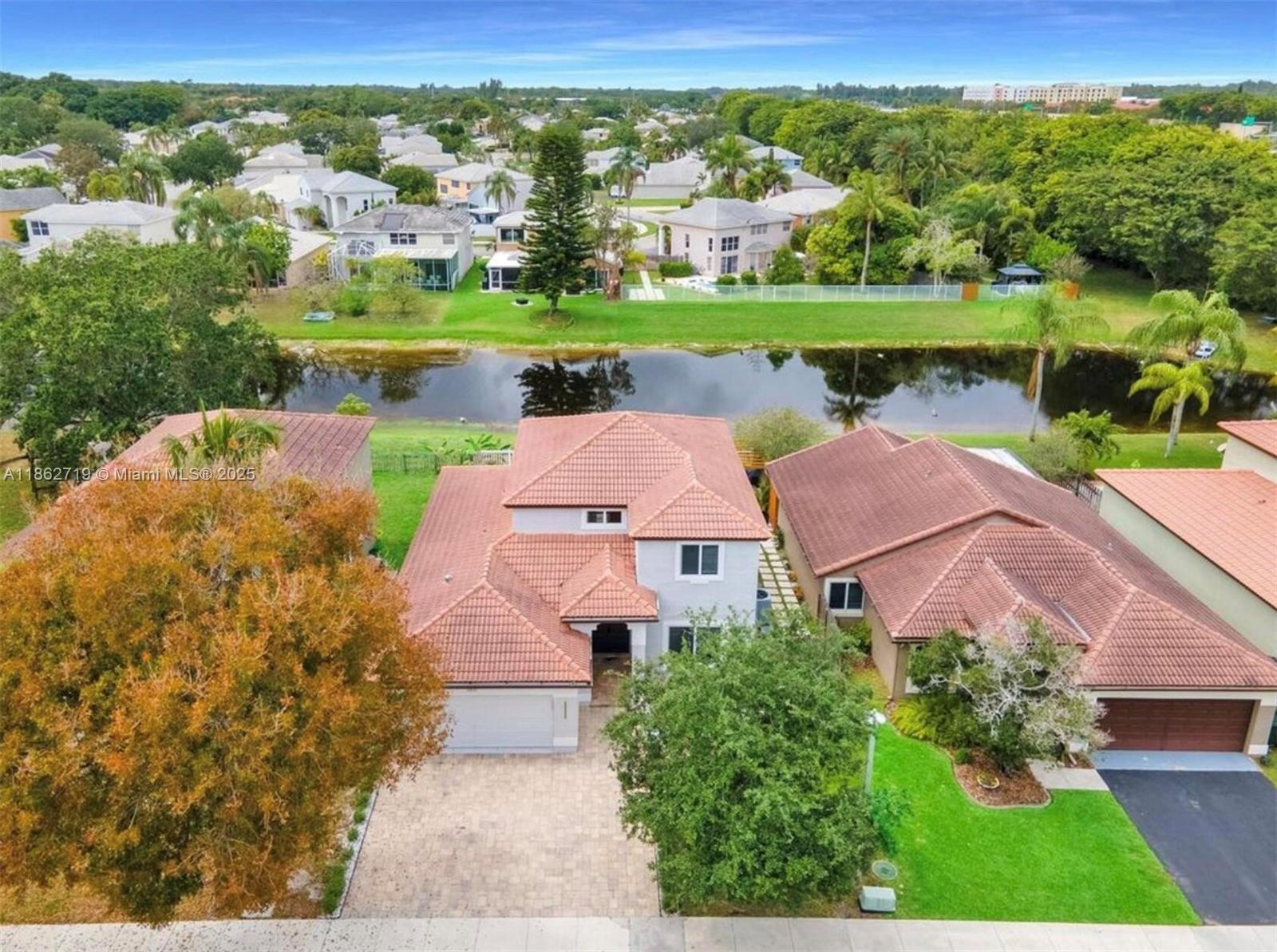 Seize the opportunity to own this fully renovated 3-bedroom, 2.5-bathroom, with a flex room - now available with competitive rates. The stunning open-concept kitchen features custom Italian cabinetry, quartz countertops, & high-end appliances. Enjoy peace of mind with hurricane-proof windows, a whole-house water filtration system, upgraded pluming, & durable laminate flooring. The two-car garage & four car driveway provides ample parking space. Outside, a private oasis awaits with a beautiful gazebo, relaxing breeze, & a serene fountain - great for entertaining. Located in a gated community with night patrol, a pool, & tennis courts - this home near top-rated schools & parks offers the best value at its price point.