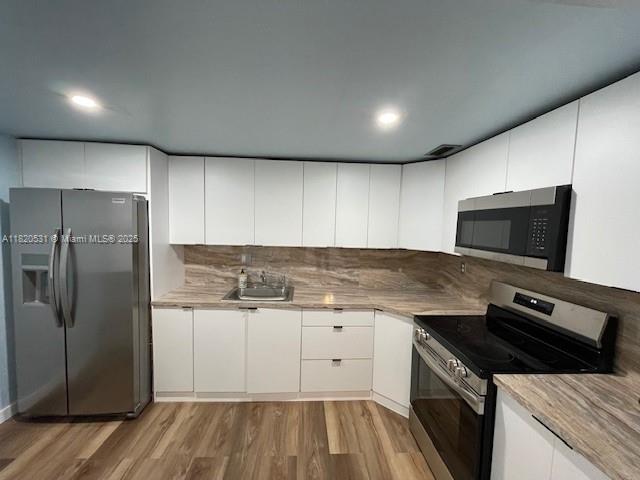 Property for Sale at 1475 Ne 125th Ter 614K, North Miami, Miami-Dade County, Florida - Bedrooms: 2 
Bathrooms: 2  - $259,900