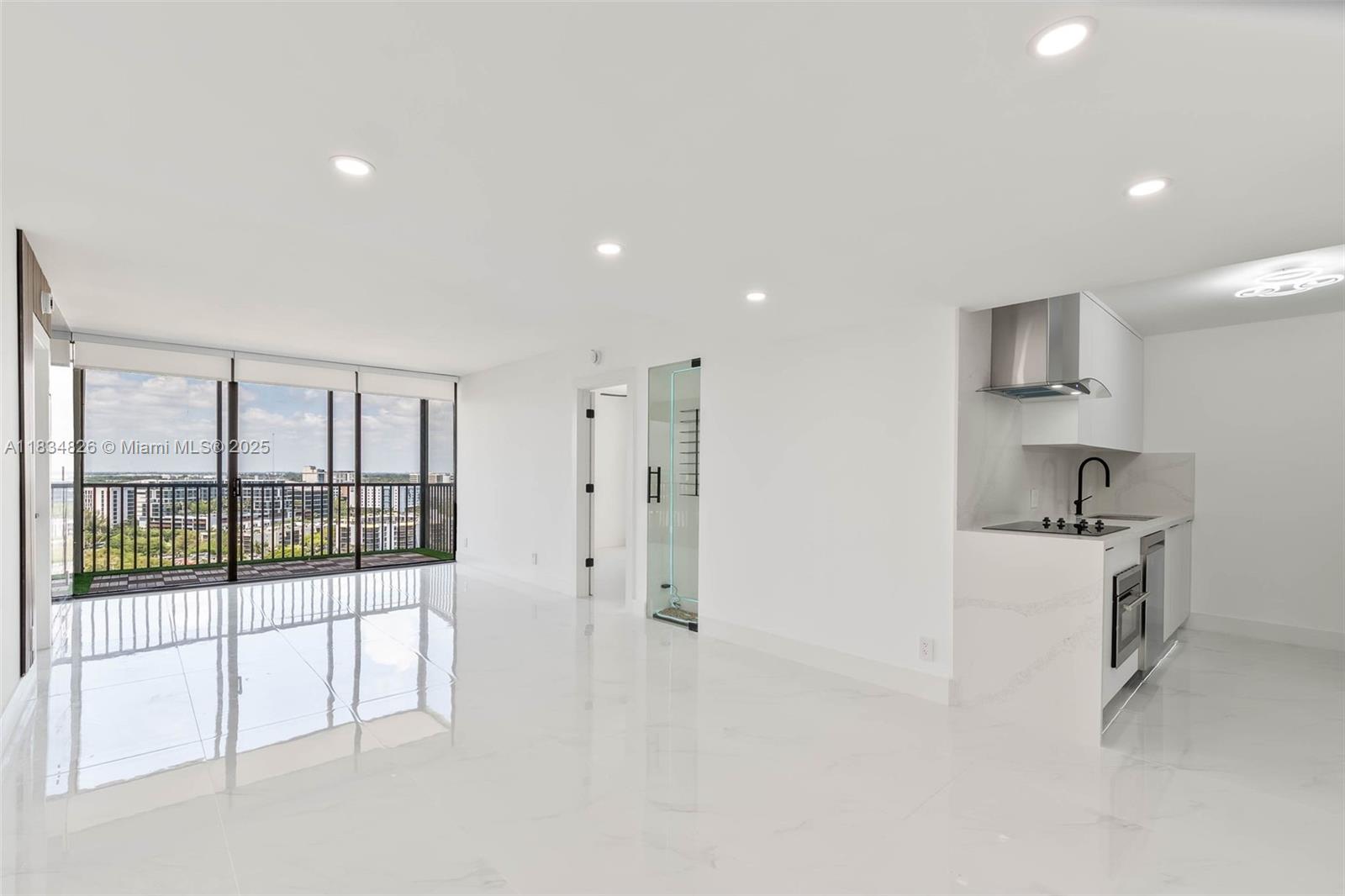 Experience elevated living from the 19th floor of this beautifully renovated corner unit in the heart of Aventura.
Enjoy breathtaking sunset views and a dynamic city skyline featuring the iconic Hard Rock Stadium and Hard Rock
Hotel. This sophisticated 2-bedroom, 2-bath residence boasts a sleek modern design with matching white quartz
countertops and backsplash, stainless steel appliances, a spacious walk-in closet, wine rack, and smart toilets for
added convenience. Set within the updated Coronado building—which has passed its 40-year certification and
maintains plenty of cash in reserves—residents enjoy premium amenities including a heated pool, jacuzzi, fitness
center, sauna, 24-hour security, and included internet and cable.