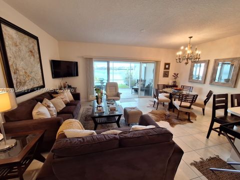 Photo of 2104 Tigris Dr, West Palm Beach, FL 33411 (MLS # A12034317)