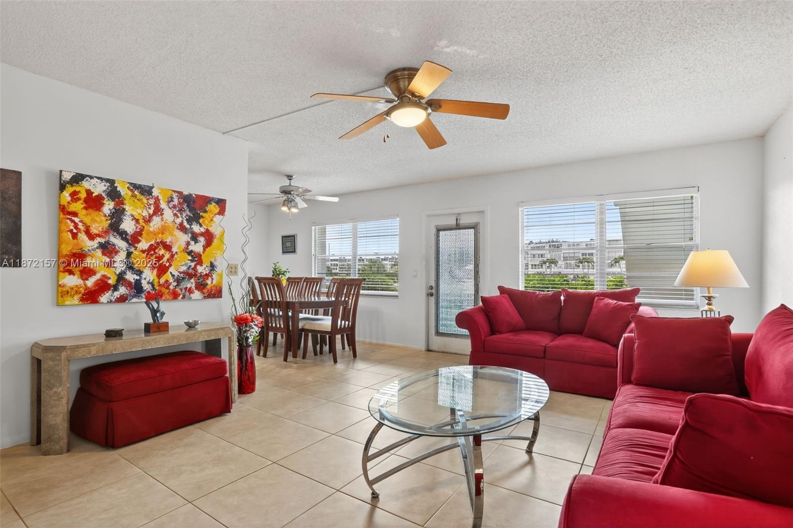 Welcome to this beautifully maintained 2-bed, 2-bath 1st-floor condo in the highly desirable Oakridge F building of Century Village East—one of South Florida’s premier 55+ communities. Both bedrooms offer direct walkout access to a stunning enclosed solarium, backing onto a peaceful conservation reserve with unmatched privacy & natural beauty. The kitchen has been beautifully upgraded and the unit is just steps away from a heated pool & BBQ area. Move-in ready, with furniture available if desired, this condo also gives you access to resort-style amenities: 1,500-seat theater, gym, tennis/pickleball courts, indoor/outdoor pools, and endless classes. Located only 3.3 miles from the beach! Building is well-managed, no special assessments, and major upgrades in 2005 — new roof & elevators.