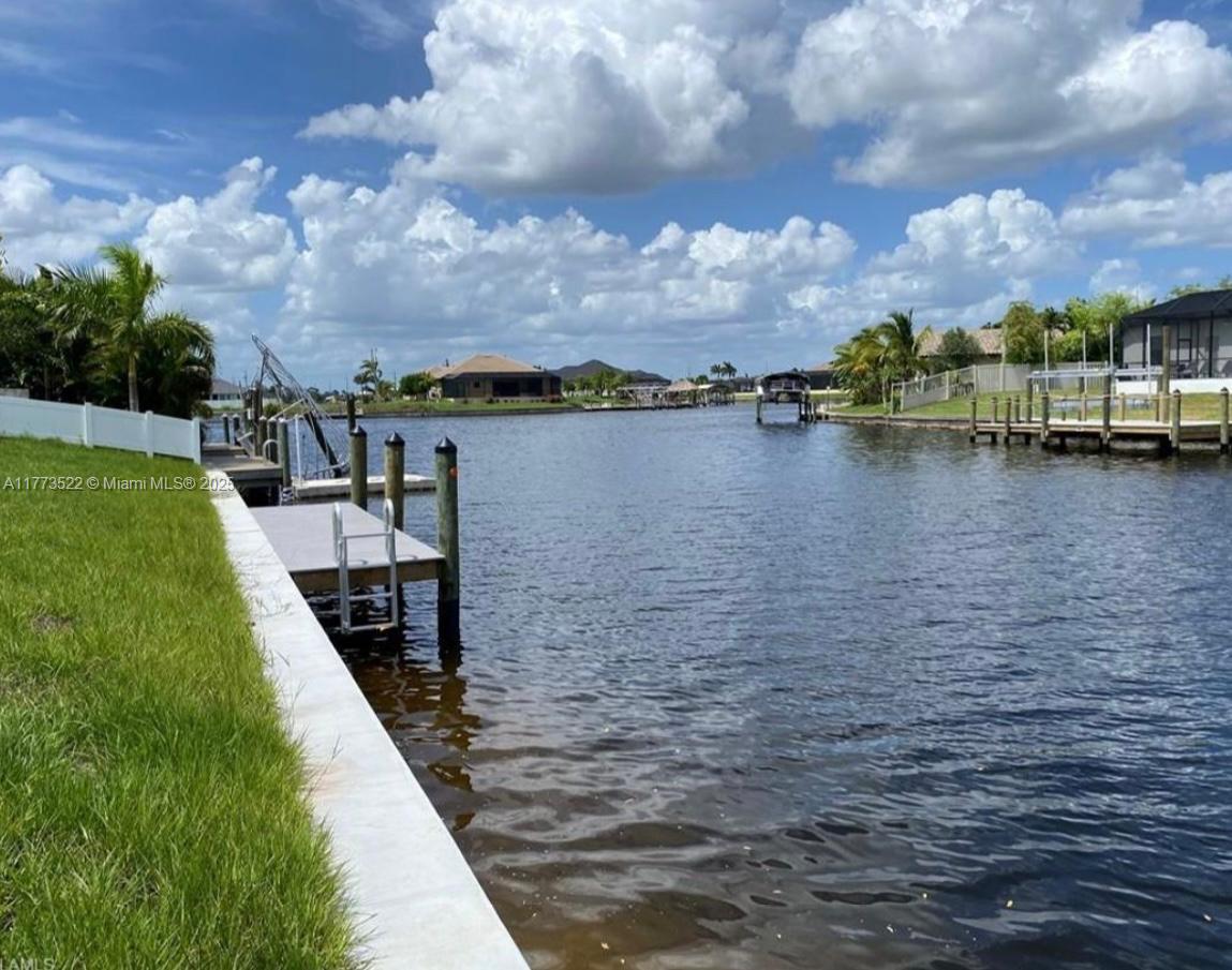 Discover the perfect opportunity to build your dream home on this spacious lot with waterfront access in beautiful Cape Coral! This prime piece of land offers direct access to scenic canals (duck)
With waterfront access, this lot is perfect for boating enthusiasts. Enjoy fishing, kayaking, and exploring the gorgeous waterways of Cape Coral at your convenience.
The vibrant Cape Coral Town Center is close by, featuring a variety of shops, restaurants, and entertainment options for your enjoyment.
For golf lovers, several excellent courses are nearby, including Coral Oaks Golf Course and Royal Tee Golf Club, providing wonderful opportunities for leisure.
Don't miss the opportunity to own this prime piece of waterfront land in Cape Coral a perfect setting for your future home!!