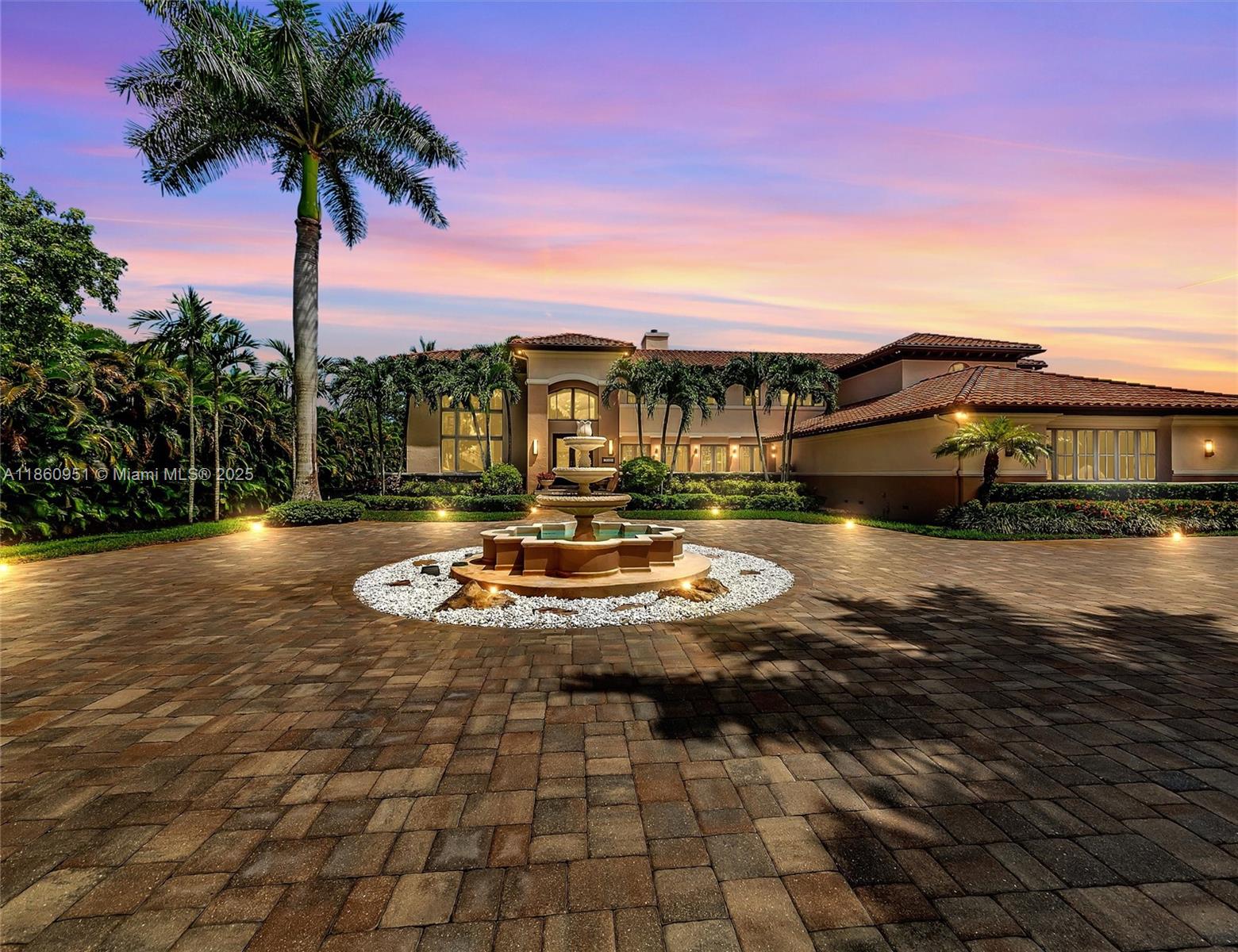 Exclusive Oak Hollow Davie, FL! Rare opportunity to own one of only 13 privileged custom estates in this private community. This architect-designed masterpiece spans two impressive stories, offering 5 bedrooms, 4.5 baths, and over 6,800 SF of living space on a builder’s acre. Crafted by the owner with uncompromising attention to detail and the finest materials, the estate features commercial-grade impact windows, soaring volume ceilings, and an expansive terrace for refined outdoor living. Abundant natural light enhances the breathtaking pool and outdoor spaces. This is the one for those seeking a lifestyle of privacy, prestige, and distinction. Schedule your private tour today!