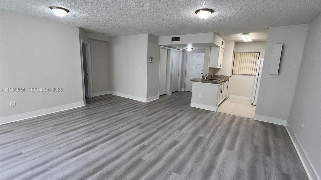 Photo of 2831 N Oakland Forest Dr #112, Oakland Park, FL 33309 (MLS # A11986554)