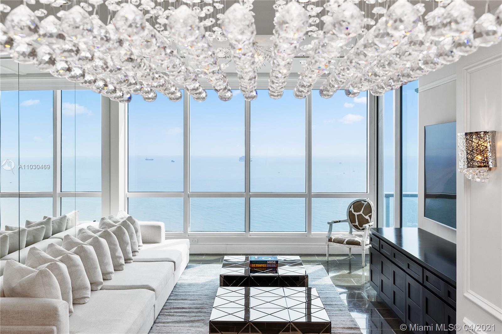 Step off the elevator into your private entry foyer with double glass doors and all you see are endless ocean views. Updated 1,870 sqft direct oceanfront 2 bedroom 2,5 bath split floor plan with bespoke built-ins and extensive custom millwork throughout. A white marble master bathroom with spa soaking tub and stone accent wall complete the ultimate master suite with large walk-in closet. The unit has been configured to maximize space, storage, and of course the spectacular ocean views. Other features include Sub-Zero and Miele appliances, a whole home air purification system, bar with built in wine storage, and smarthome automation to control audio and video throughout. The unit also comes with 2 assigned parking spaces and a generous storage locker.