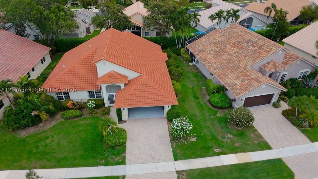 Photo of 7367 Sterling Falls Ln, Boynton Beach, FL 33437 (MLS # A12075764)