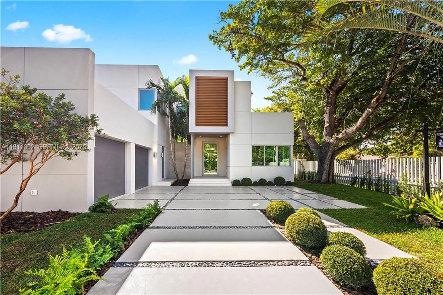 Experience luxury living in this brand-new 2025 modern residence by Built By Design Miami, ideally located in one of Coconut Grove’s most desirable neighborhoods; set on Miami-Dade's highest street with an elevation of close to 20 feet. With 6700 SF, this 6BR, 8BA home blends sophistication with everyday comfort. Features include 11’ ceilings, floor-to-ceiling impact windows, and a stunning Maistri La Cucina kitchen with Taj Mahal quartzite, Gaggenau appliances, and a custom pantry—perfect for both daily living and entertaining.
Enjoy a resort-style backyard with pool, summer kitchen, cabana bath, and lush tropical landscaping that embodies the Grove lifestyle. Smart home upgrades include Lutron lighting, integrated speakers, and Honeywell security. Minutes to top schools, parks, marinas, Brickell & Coral Gables—luxury, privacy, and the best of Coconut Grove living.