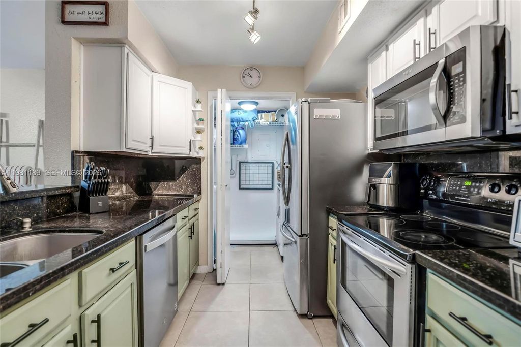 Photo of 875 Riverside Dr #712, Coral Springs, FL 33071 (MLS # A11981189)