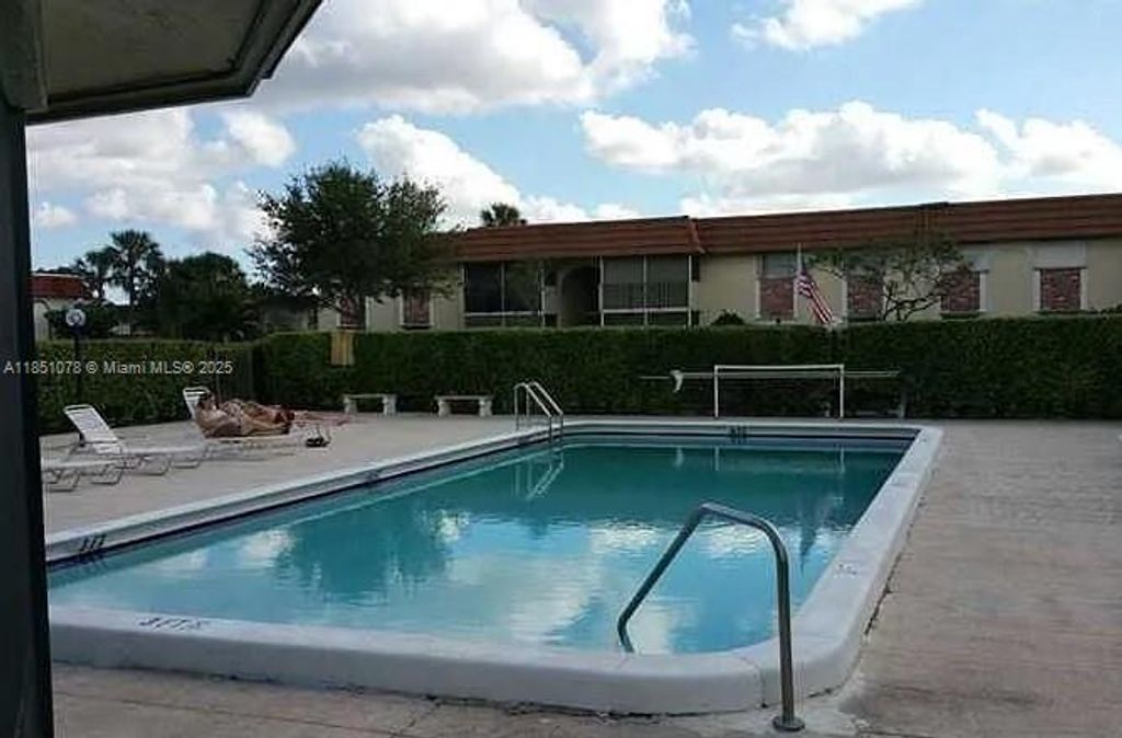 Photo of 22745 SW 66th Ave #4-104, Boca Raton, FL 33428 (MLS # A11851078)