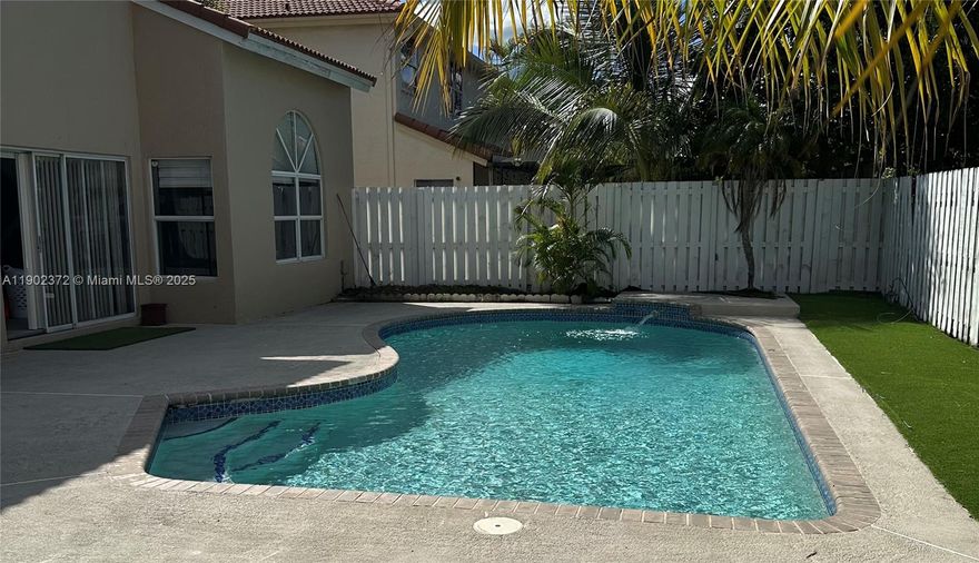 Undervalued and priced for a fast sale! This beautiful 4-bedroom, 2.5-bath home is nestled in one of the most sought-after neighborhoods, just minutes from the popular Sawgrass Mills Mall, and major highways. Enjoy peace of mind with a new roof installed just 2 years ago and a sparkling pool recently resurfaced, perfect for year-round enjoyment. This spacious residence features a bright, open layout with generous living areas and comfortable bedrooms, ideal for both family living and entertaining. Some upgrades are being completed before closing, adding even more value to this move-in-ready gem. Don’t miss your chance to own this incredible home at an unbeatable price — schedule your private showing today!