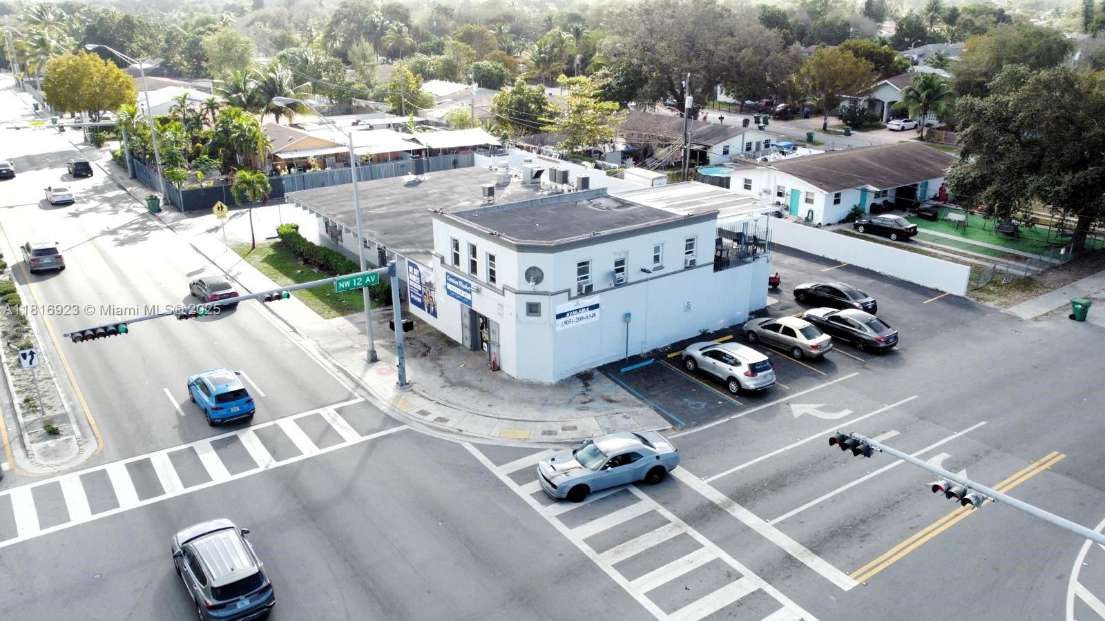 Located in the heart of Miami, at 103rd St and 12th Ave, this BU-1 zoned property is situated in an up-and-coming, rapidly evolving neighborhood with 30,500 vehicles passing by daily. Surrounded by major franchises and businesses, this mixed-use property offers unparalled visibility and accessibility, making it an ideal investment for both owner-users and investors.
Currently, the property is leased to a restaurant, a marketplace, and two residential units above, which are Section 8 approved, ensuring stable rental income. The property has been newly upgraded, featuring modern finishes, fresh asphalt, a newly painted exterior, upgraded lighting, and more.