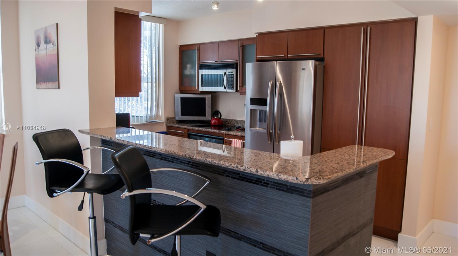 Turn Key fully furnished corner apartment with wrap around balcony in a newer construction boutique luxury condominium located directly on the beach. Large 2 bedrooms, 2.5 baths, washer/dryer inside. Assigned garage covered parking. Open style modern kitchen, granite counter top, stainless steel appliances. Well-managed full service building: 24/7 security, concierge, valet parking, great gym, tennis courts on premises, heated pool with covered pavilion, hut tub, deeded beach access. Amazing investment opportunity: 12 times a year rentals allowed. Unit is currently rented to a great tenant until August 1st, 2021, with a 45-day kick-out clause. Conveniently located close to airports, fine dining, exquisite shopping malls, and Gulfstream Village!