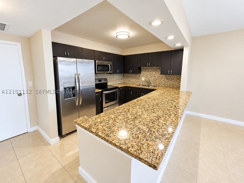 Photo of 2500 Parkview Dr #307, Hallandale Beach, FL 33009 (MLS # A12101112)