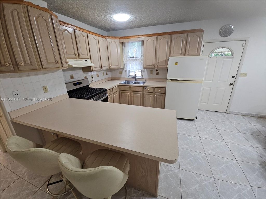 Photo of 2323 Polk St #C, Hollywood, FL 33020 (MLS # A11956041)