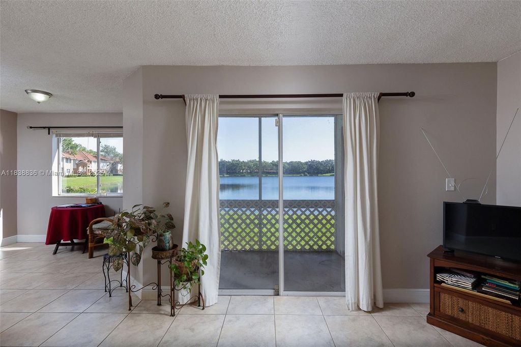 Photo of 706 NW 92nd Ave #706, Plantation, FL 33324 (MLS # A11838836)