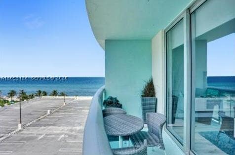 Photo of 3901 S Ocean Dr #7C, Hollywood, FL 33019 (MLS # A12053128)