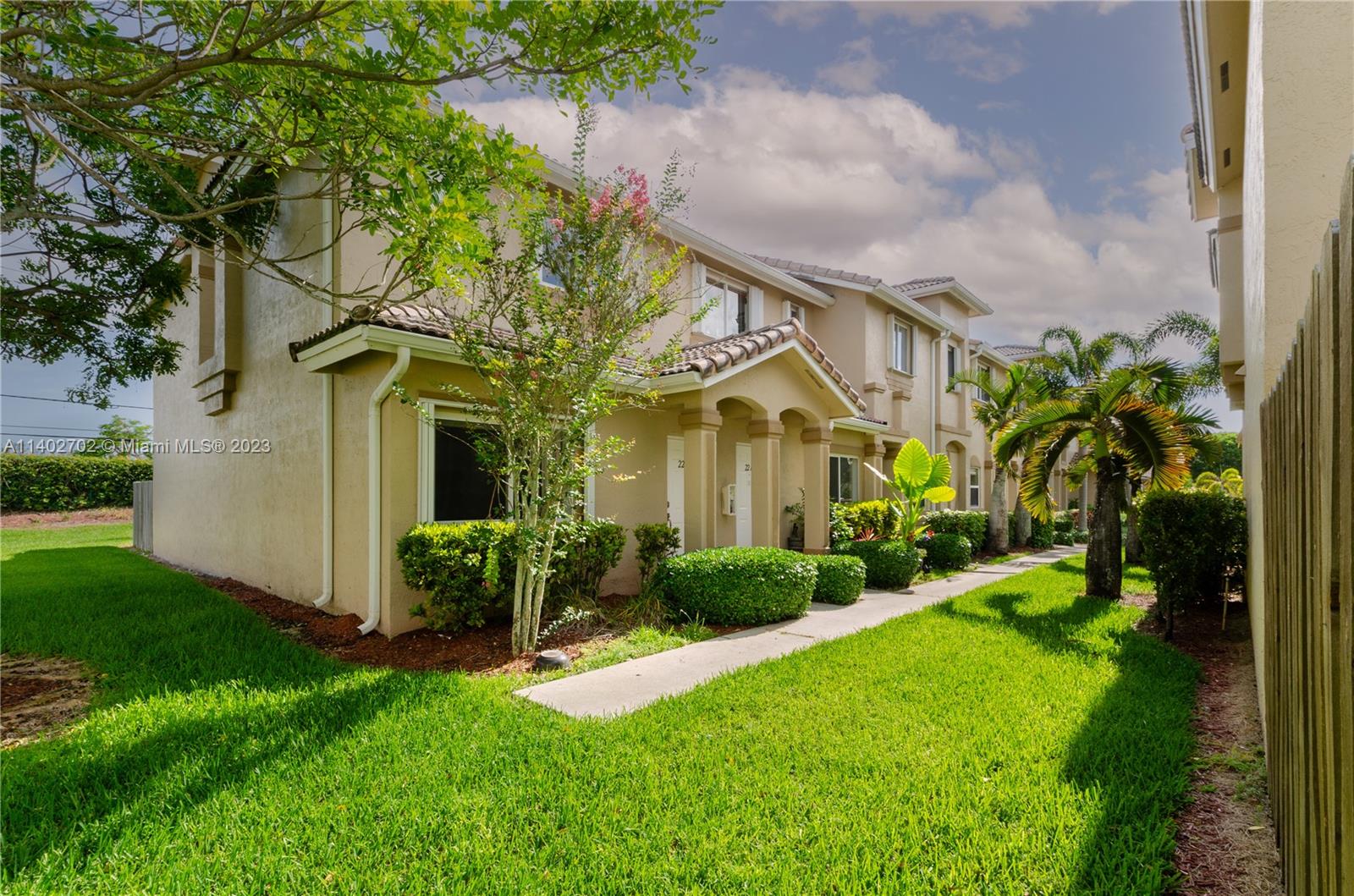 Welcome to this beautiful and spacious corner townhouse with 2 bedrooms and 2.5 baths, located in a gated community in Homestead. Enjoy the modern updates including the stainless steel appliances in the kitchen, as well as the convenience of a fenced patio and an in-unit washer and dryer. Each bedroom includes a private bathroom. No carpet. The townhouse also comes with 2 parking spaces and access to community amenities, including internet and cable.