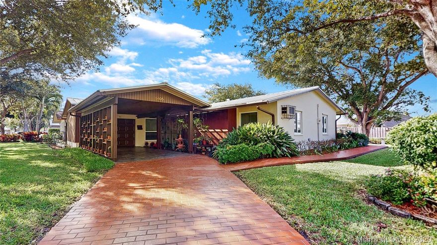 Fantastic Cutler Bay three bedroom two bathroom home located on an over-sized corner lot. Beautiful home open modern kitchen with granite countertops, stainless steel appliances, spacious living and dining areas filled with natural light. Tile in living area and carpet in the bedrooms along with updated baths and impact windows. The yard is well-maintained, with plenty of room to add an assortment of trees. The home's front has ample space to park plenty of cars, which is ideal for larger families.  A must see to appreciate.