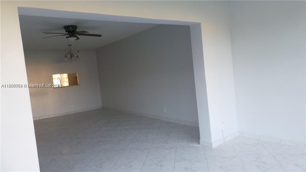 Photo of 5031 W Oakland Park Blvd #103, Lauderdale Lakes, FL 33313 (MLS # A11808982)