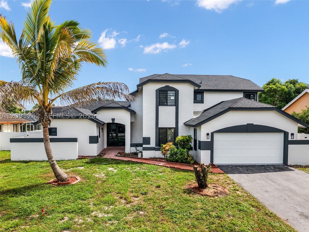 Photo of 7350 NW 54th Ct, Lauderhill, FL 33319 (MLS # A12091242)