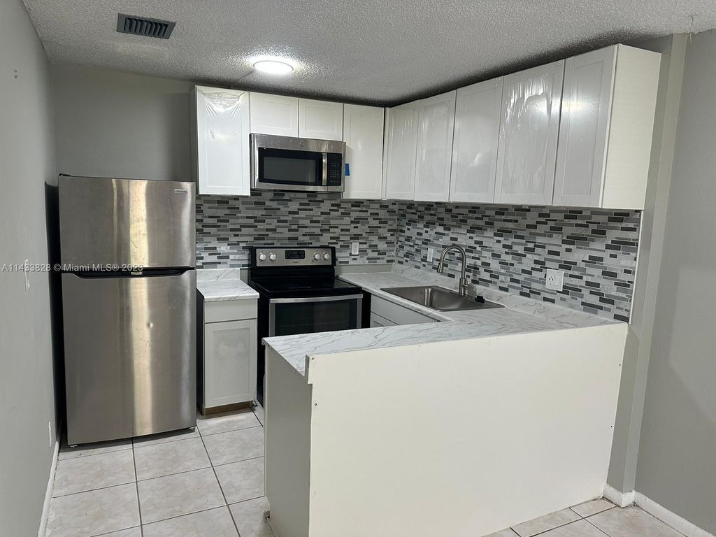 Photo of 11544 NW 44th St #0, Coral Springs, FL 33065 (MLS # A11433828)