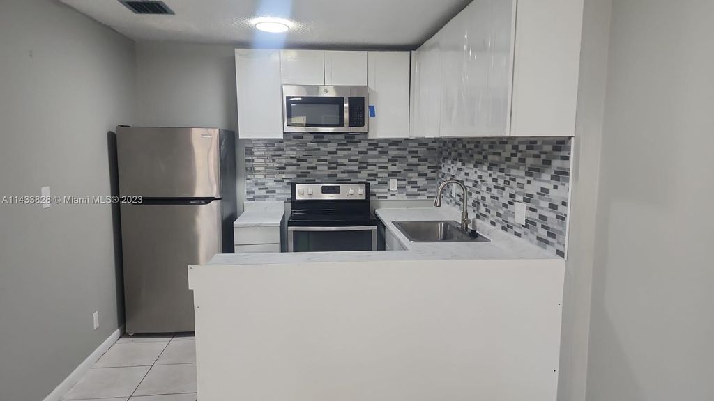 Photo of 11544 NW 44th St #0, Coral Springs, FL 33065 (MLS # A11433828)