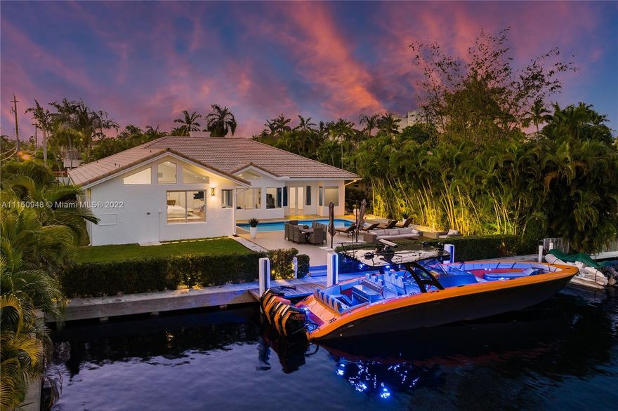 Welcome to a one of a kind completely renovated home in the exclusive gated community of Golden Isles. No expenses were spared in this one story gem.  Bright wood floors and high ceilings throughout, This home features 5 Bedrooms and 4.5 Bathrooms on a oversized 11.400 SF Lot. The outdoor area is very special as you are surrounded by lush landscaping, a large pool deck for entertaining, and a fully equipped dock for yacht enthusiast!! 85 FT OF WATERFRONTAGE!!  Golden Isles is home to the deepest water canals in all of Broward County!! BITCOIN is accepted.