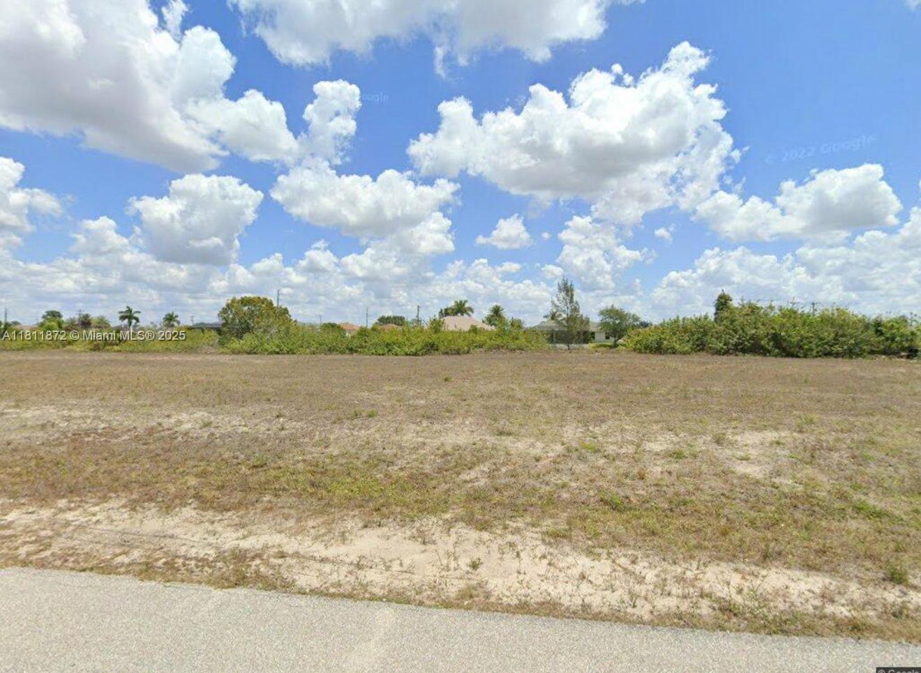 “Great opportunity to own a buildable lot with canal access in Cape Coral! Enjoy the benefits of a nearby canal—perfect for boating and recreation—without the waterfront price. Located in a quiet, growing neighborhood with easy access to shopping, dining, and major roads. Ideal for your future Florida dream home or investment!”