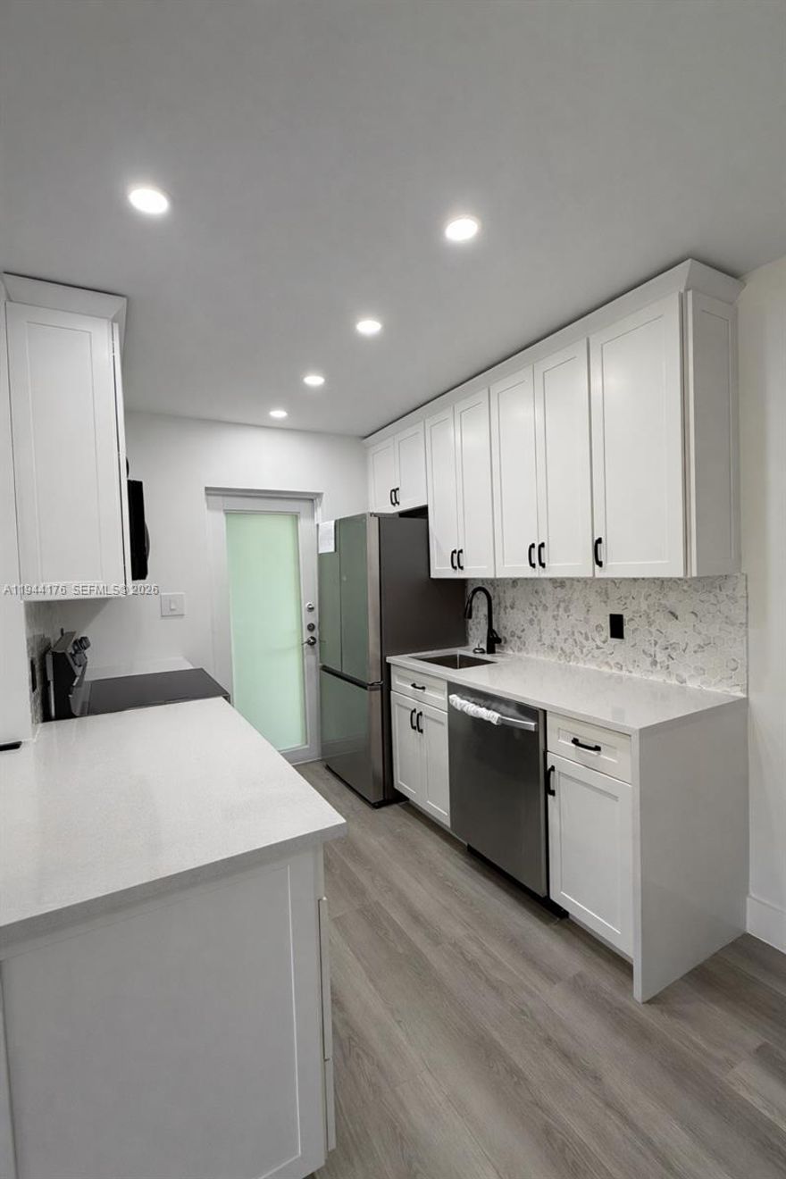 Newly renovated 1-bedroom residence filled with natural light in a secure, gated building, ideally located in the highly desirable South of Fifth neighborhood. The unit features impact windows and doors, a private balcony, and a bright, open layout. Just a few blocks from the ocean and steps from a scenic waterfront park with cruise views and breathtaking sunsets. Building offers a new roof, no assessments. Includes one assigned parking space. Prime location with immediate rentals allowed — truly a lifestyle opportunity.