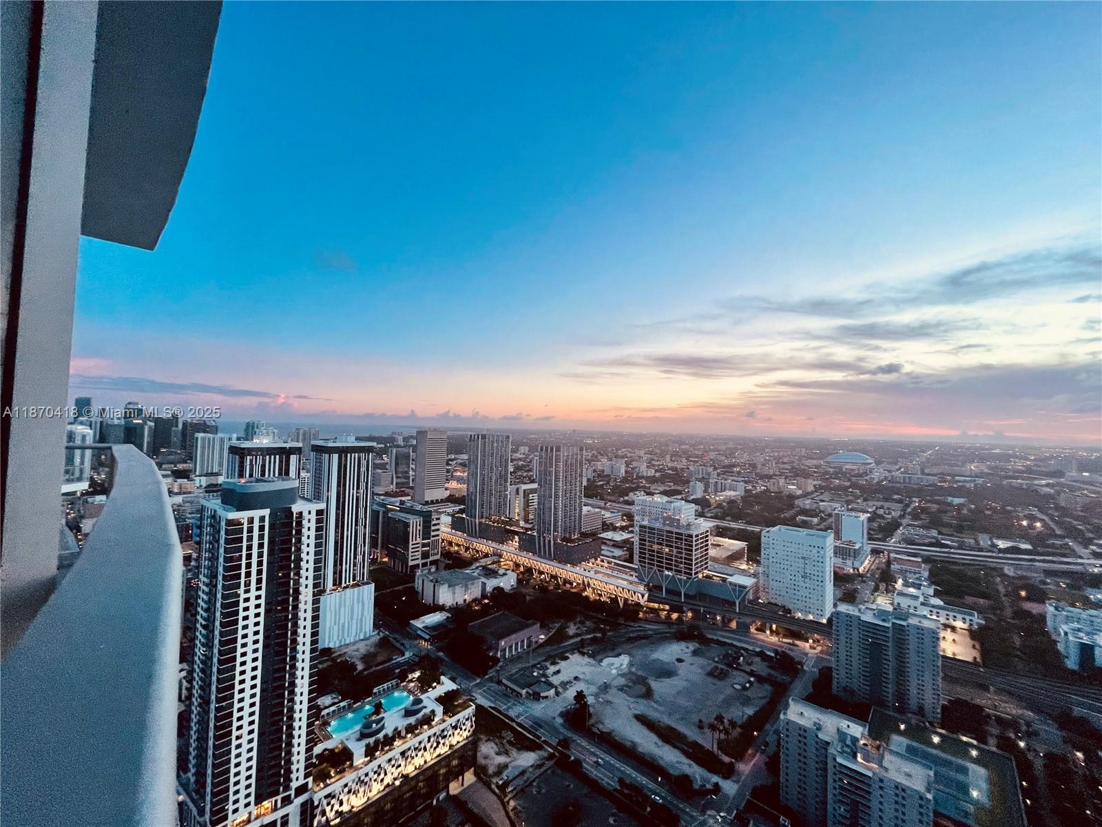 Now you can live in the most sought out adult playground, Paramount Miami Worldcenter: A City within a City. Boosting the world's most amenities topping at over 50. Spacious one bedroom, plus DEN and two full bathrooms. Unit can easily be used as a 2 bedroom. Large dine-in terrace offering panoramic city sunset hues. Elevator with large private foyer. Custom built-out closet systems, window treatments, quartz countertops, Italian kitchen cabinetry and top-of-the line appliances. Unit also features: floor-to-ceiling impact sliding doors, separate washer/dryer, pre-wired for cable/internet, porcelain flooring throughout with and marble floors in master bathroom. 5-star amenities include boxing studio, virtual golf putting, recording studio, theatre, kids pool, basketball court and much more.
