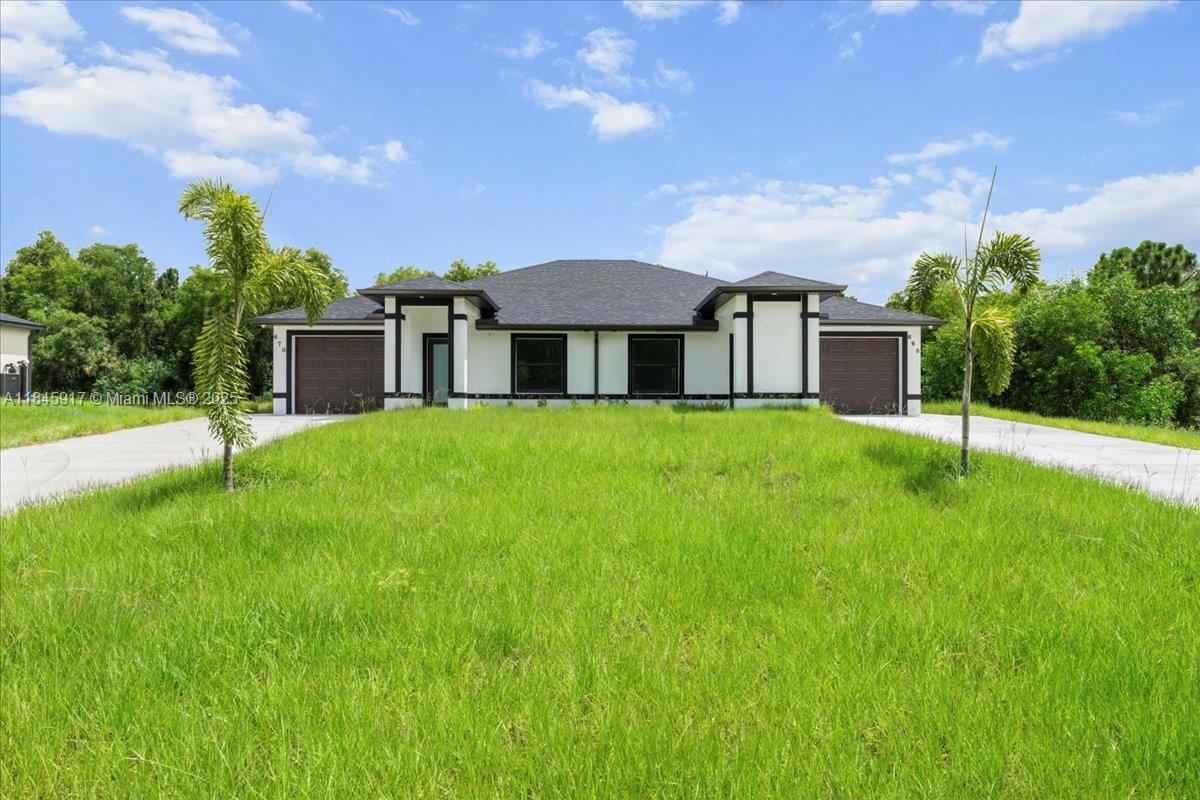 Welcome to this stunning brand new construction duplex offering 3 spacious bedrooms and 2 modern bathrooms each. This home features elegant porcelain tile flooring throughout and a stylish kitchen with quartz countertops, perfect for cooking and entertaining. Enjoy the convenience of a one-car garage and ample living space, ideal for families or investors. Step outside to a peaceful canal-front backyard, providing a serene setting for morning coffee, evening relaxation, or weekend barbecues. Located in a quiet neighborhood, close to great schools, this property offers the perfect blend of comfort, functionality, and outdoor charm. Don’t miss out on this exceptional opportunity!