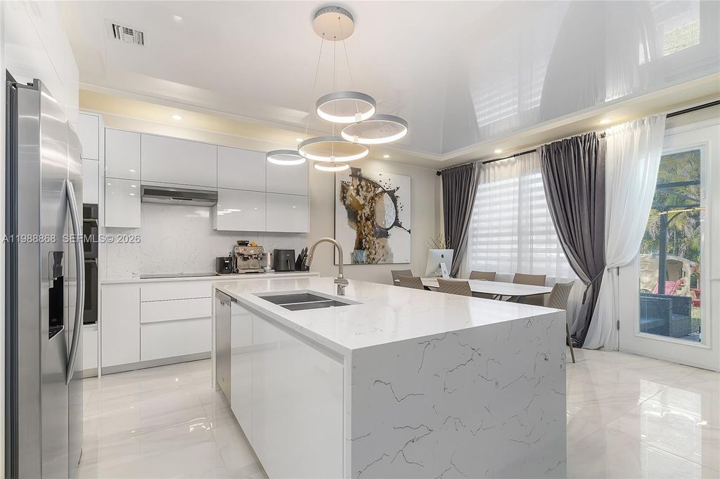 Photo of 1475 Silk Oak Dr, Hollywood, FL 33021 (MLS # A11988868)