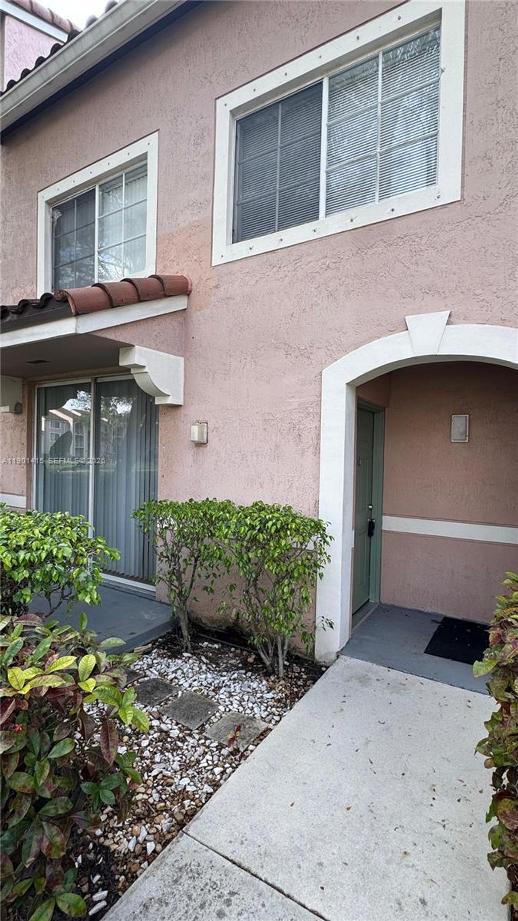 Photo of 12160 Saint Andrews Pl #104, Miramar, FL 33025 (MLS # A11901415)
