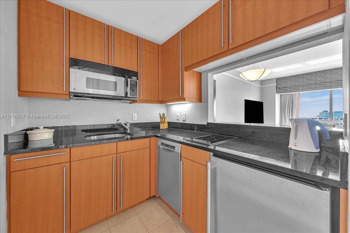 MILLENNIUM TOWER CONDOMIN - Residential