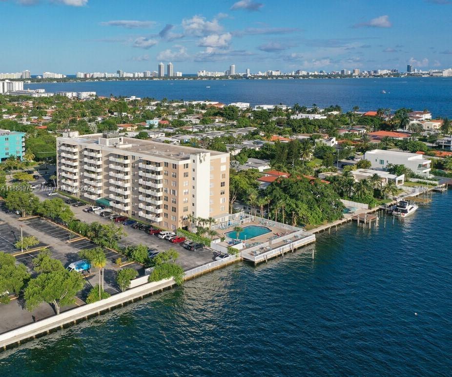 Beautiful bright 1 Bed/1 Bath unit in highly sought-after North Bay Village. This spacious 817 sq ft home features butcher block kitchen countertops & stainless steel appliances, tile floors throughout, a large walk-in closet, shower/tub combination, a large balcony w/ partial bay/sunset views, & 1 assigned parking space. The building offers amenities, including a bayfront pool w/ breathtaking views, BBQ area, gym, laundry facilities on each floor, & on-site management. Located in a vibrant & flourishing neighborhood with lots of development, you'll enjoy close proximity to stunning beaches, easy access to highways and walking distance to Elementary & preschools, playground, supermarket, shopping, dining, entertainment, & more. 60 Year Recertification Special Assessment paid by seller.