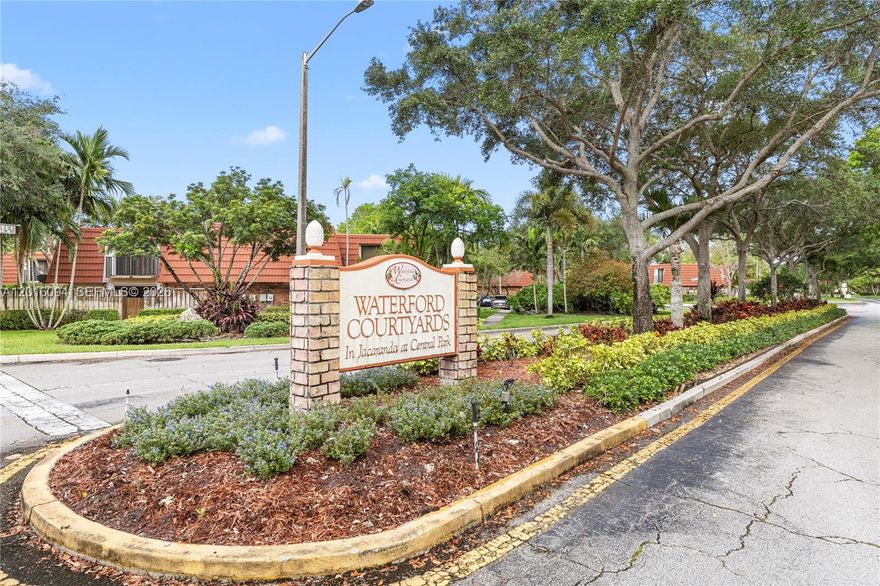Welcome home to this charming corner-unit townhome offers a rare blend of nature, comfort, and convenience, with beautiful water views and a quiet setting that feels tucked away while still being close to everything. Located in the desirable Jacaranda/Central Park area, this 2-bedroom, 2.5-bath townhome offers the feel of a single-family home with two assigned parking spaces, a spacious private patio overlooking the lake, and balconies off both bedrooms where you can take in the tranquil scenery.

The first floor features tile & carpet flooring, a full-size washer and dryer, ample indoor and outdoor storage, and a layout ready for your personal touch. Roof replaced in 2020 and accordion shutters throughout provide added peace of mind. 

The outdoor space is perfect for relaxing, entertaining, or enjoying quiet mornings with your coffee while overlooking the water. Located just minutes from shopping, dining, entertainment, Sawgrass Mills Mall, Las Olas, downtown Fort Lauderdale, the airport, and beautiful beaches, this home offers both convenience and a serene lifestyle.
Jacaranda Central Park is nearby with amenities such as heated pools, whirlpool spa, pickleball and tennis courts, indoor racquetball, shuffleboard, clubhouse, scheduled transportation, and organized activities. Schedule your showing today!
