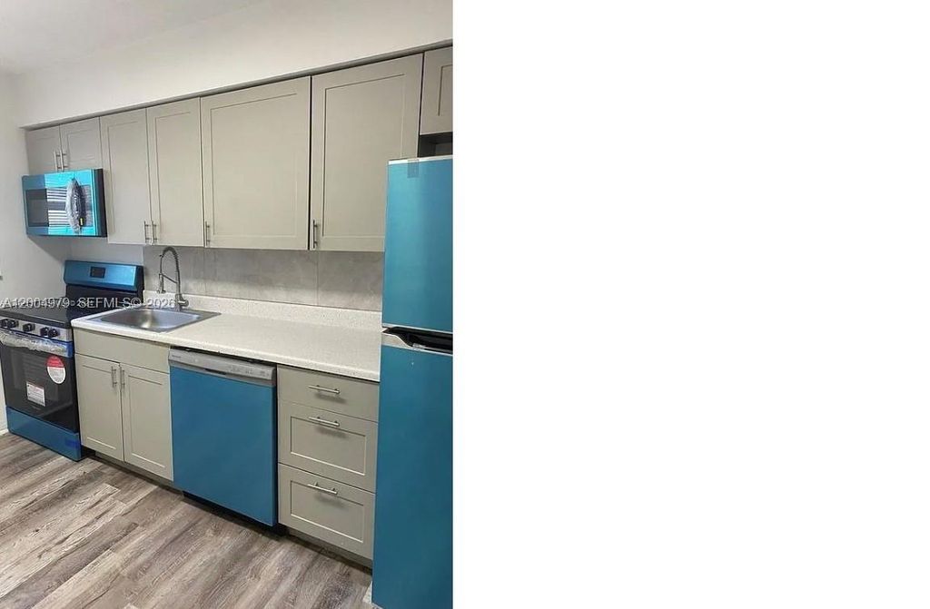 Photo of 1051 NW 27 Ave #1, Fort Lauderdale, FL 33311 (MLS # A12004979)